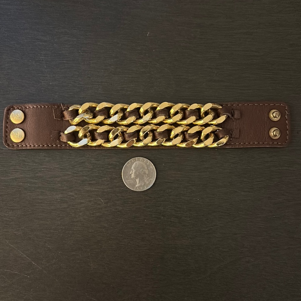 Leather cuff with gold detail